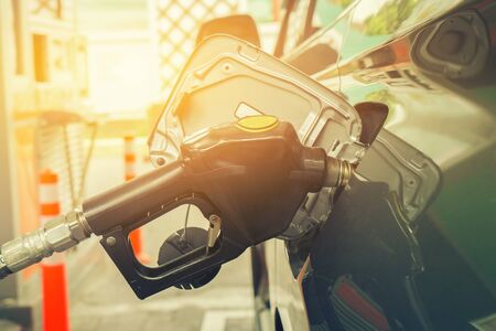 Refill and filling Oil Gas Fuel at station,vintage color,selective focusの写真素材