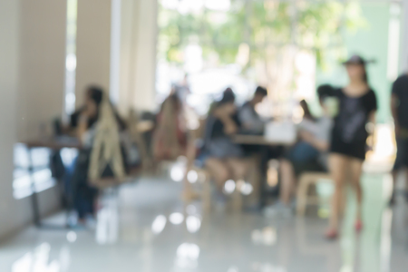 Blur or Defocus image of Coffee Shop or Cafeteria ,Customer at restaurant blur background with bokeh for use as Background,vintage retro colorの写真素材