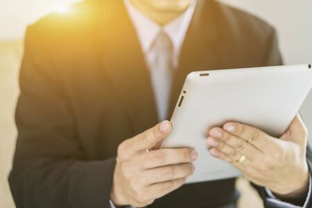 Asian Business man use tablet pcの写真素材