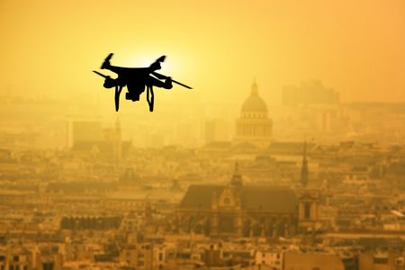 Drone silhouette flying above Paris , france with sunset, great for your design and background,vintage color,selective focusの写真素材