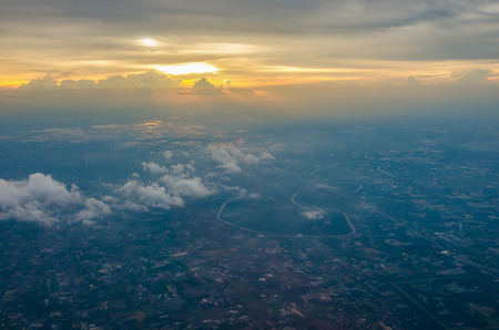 sunrise ,Sky and cloud as seen through window of an aircraft,selective focus