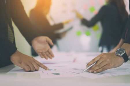 Business People Planning Strategy Analysis Office Concept, Project managers meeting, Business crew working with new startup,Teamwork ,man and woman discussion document in the officeの写真素材
