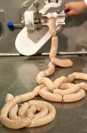 Production of sausage in a meat factoryの写真素材