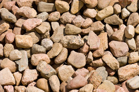 pile of stones of different sizes backgroundの写真素材
