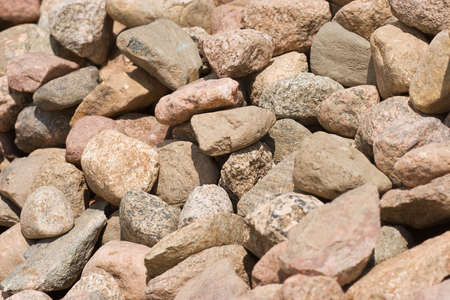 pile of stones of different sizes backgroundの写真素材