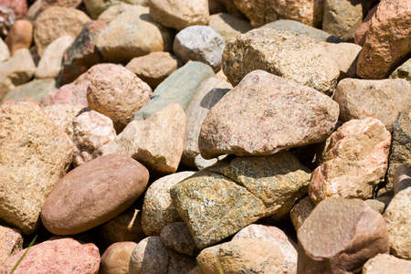 pile of stones of different sizes backgroundの写真素材