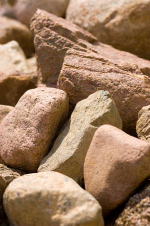 pile of stones of different sizes backgroundの写真素材
