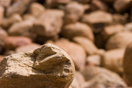 pile of stones of different sizes backgroundの写真素材