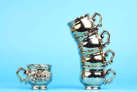 Coffee cups from  service from  service on a blue backgroundの写真素材