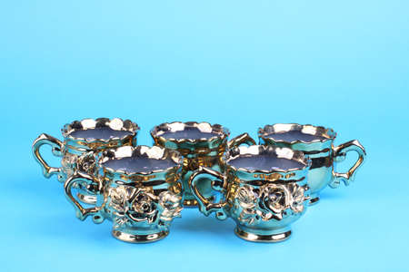 Coffee cups from  service from  service on a blue backgroundの写真素材