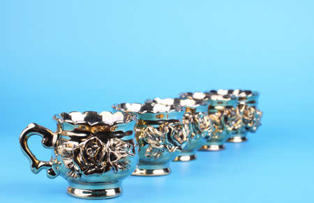 Coffee cups from  service from  service on a blue backgroundの写真素材