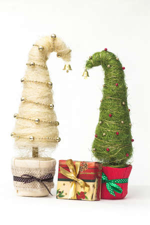 Shiny miniature Christmas trees made of sisal with beadsの写真素材