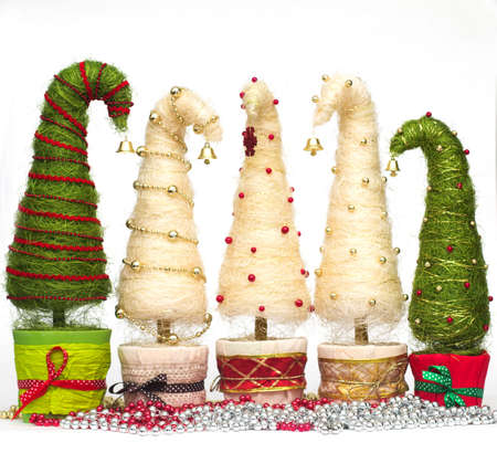 Shiny miniature Christmas trees made of sisal with beadsの写真素材