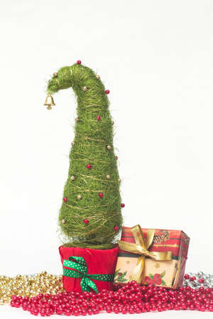 Shiny miniature Christmas tree made of sisal with beadsの写真素材