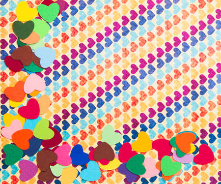 corner of multicolored paper hearths   on multicolored paper