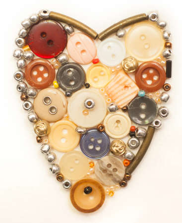 Colorful buttons heart on whiteの写真素材