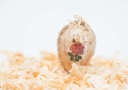 easter egg made decoupage methods on sawdustの写真素材