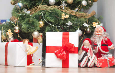 colorful shot of a Christmas tree with gift boxesの写真素材