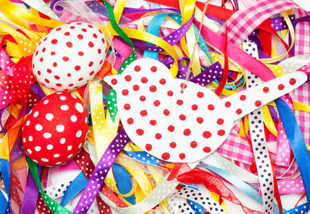 coloroful  wood birds  with eggsの写真素材