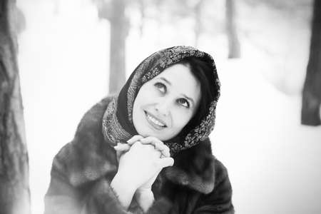 beautiful woman in winter parkの写真素材