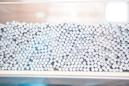 a lot of cigarettes at a tobacco factory
