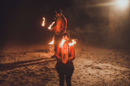 Beauty fire show in the darkの写真素材