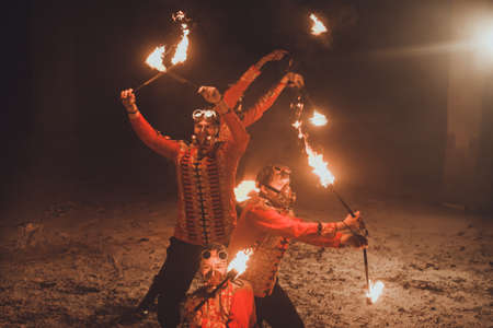 Beauty fire show in the darkの写真素材