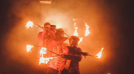 Beauty fire show in the darkの写真素材