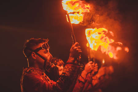 Beauty fire show in the darkの写真素材