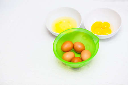 egg in a cup in the kitchenの写真素材