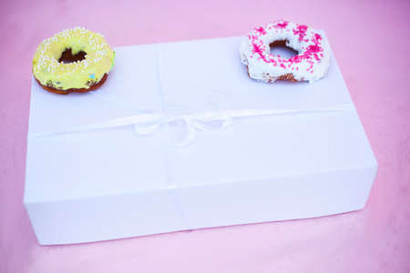 sweets and colorful donuts in boxの写真素材