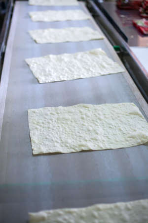 Pita on the production line at the bakery .の写真素材