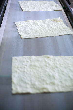 Pita on the production line at the bakery .の写真素材