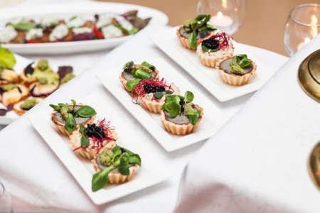 delicious appetizers on a table in a restaurant.の写真素材