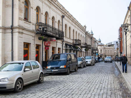 KUTAISI, GEORGIA - FEBRUARY 23, 2016: old street with houses and stone road.のeditorial素材