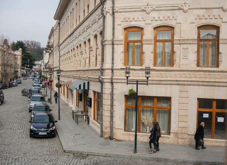 KUTAISI, GEORGIA - FEBRUARY 23, 2016: old street with houses and stone road.のeditorial素材
