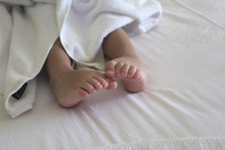 A close-up of baby feet. focused on foot.の写真素材