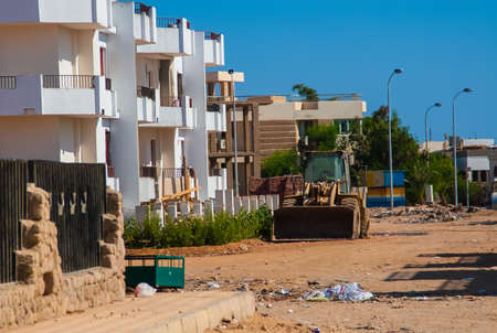 SHARM EL SHEIKH, EGYPT - JULY 9, 2009. Unfinished buildings in downtown with trash.のeditorial素材
