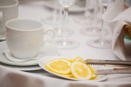 Cup of tea with lemon on table close-upの写真素材
