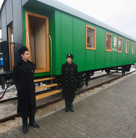 GRODNO, BELARUS - DECEMBER 27, 2012. People in retro train, old wagon interiorのeditorial素材