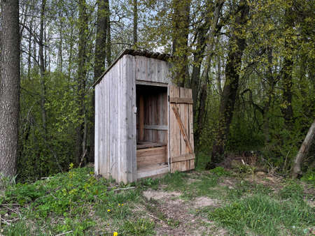 Old rural toilet in natureの写真素材