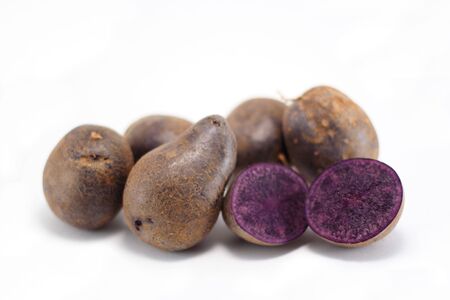 A group of Peruvian blue potatoes.の写真素材