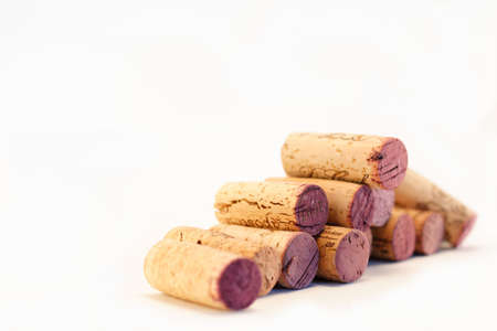 A pyramid style stack of wine corks.の写真素材