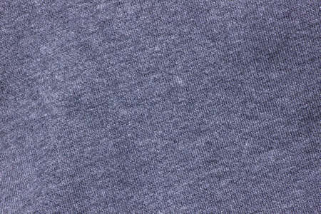 dark blue almost violet cloth background textureの写真素材
