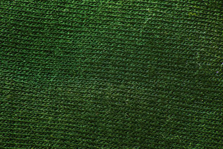 green fabric texture. Useful as a backgroundの写真素材