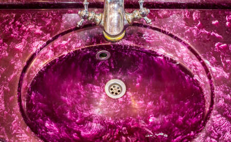 Retro pink magenta bathroom sink.の写真素材