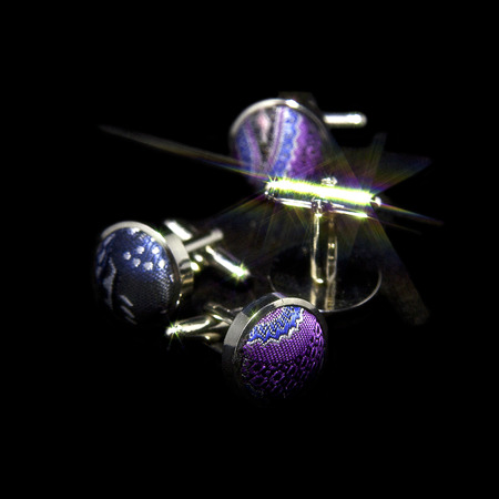 Cufflinks on a black background