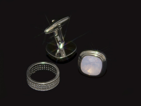 Cufflinks on a black background