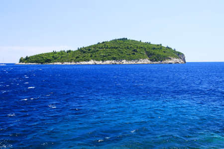 Small island in blue seaの写真素材