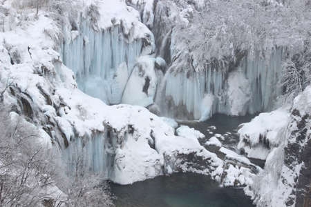 Frozen waterfalls on Plitvice lakes, National park in Croatiaの写真素材